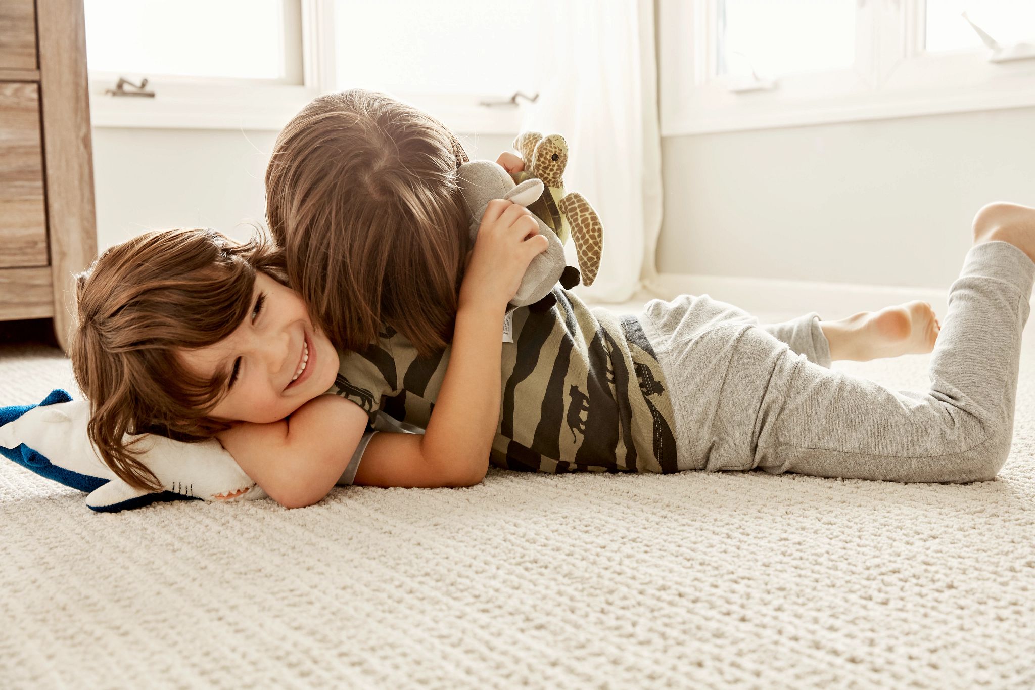 Boys wrestling on Subtle Aura carpet